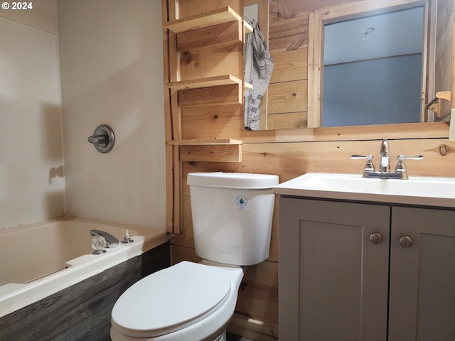 bathroom with toilet and vanity