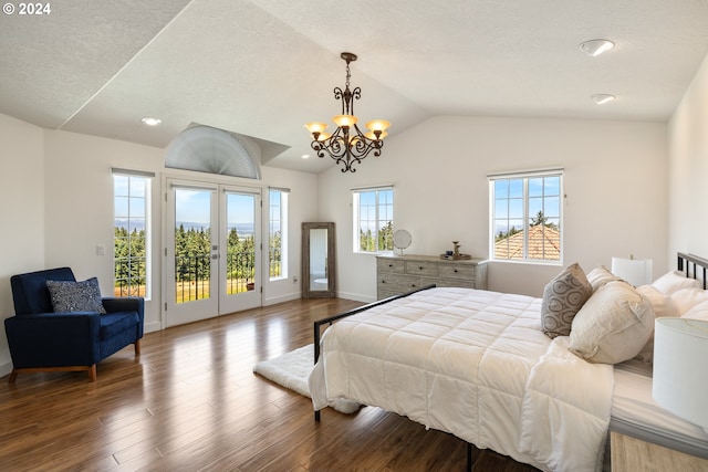 bedroom with access to outside, a chandelier, vaulted ceiling, and wood-type flooring