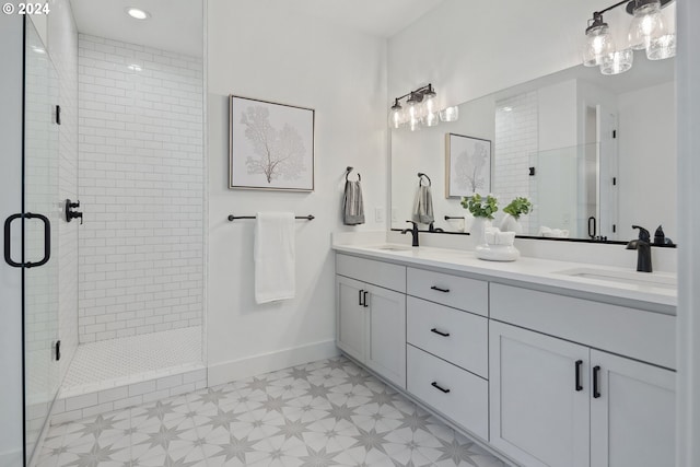 bathroom with vanity and an enclosed shower