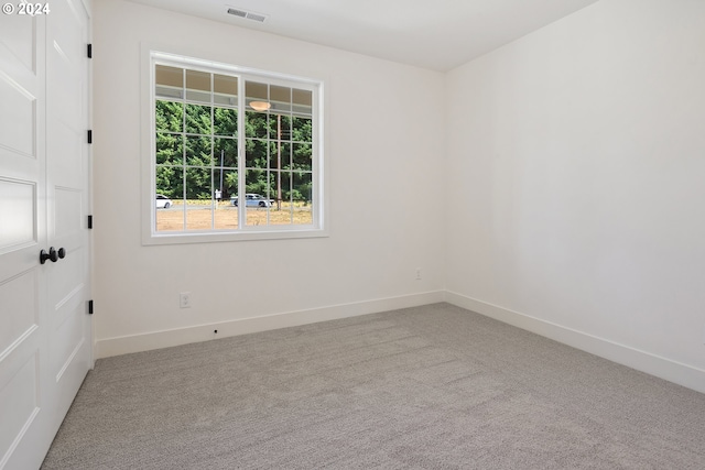 unfurnished room with carpet