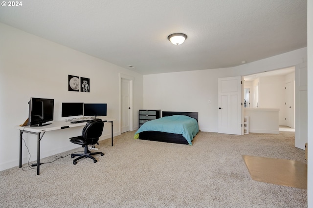 bedroom with light carpet