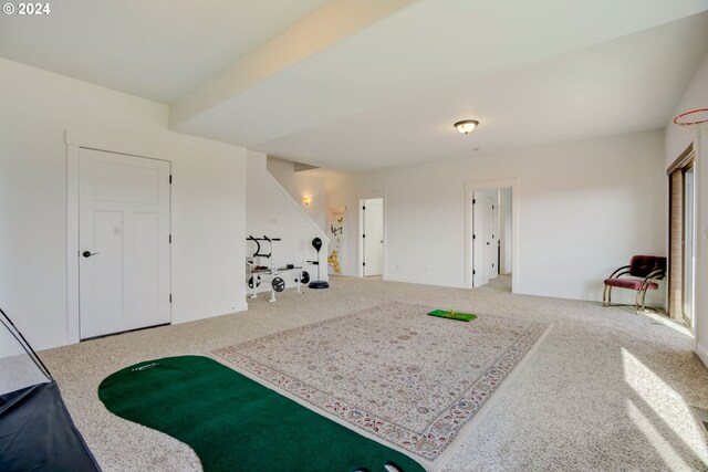 game room with light carpet