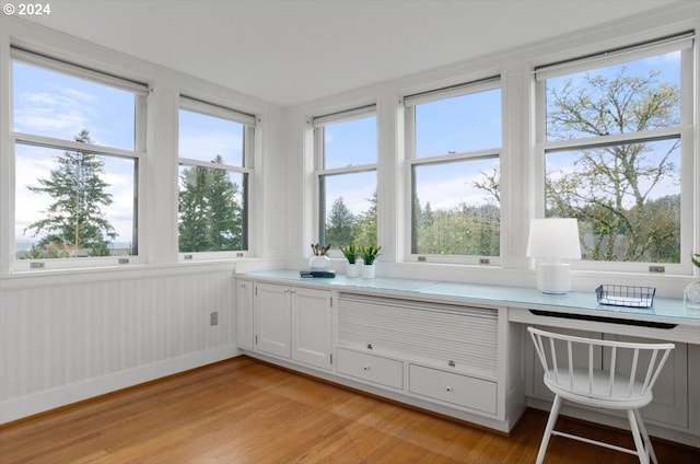 unfurnished sunroom featuring a healthy amount of sunlight