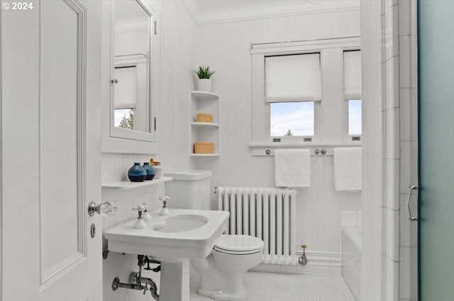 full bath with tile patterned flooring, toilet, a shower, radiator, and crown molding