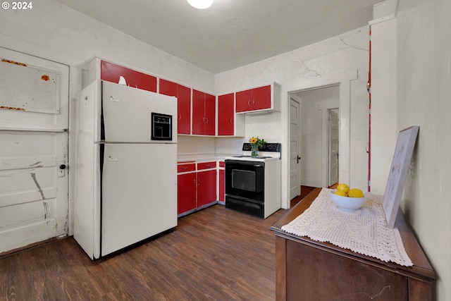 kitchen featuring dark hardwood / wood-style flooring and white appliances