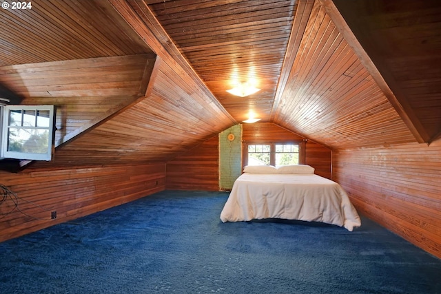 unfurnished bedroom featuring dark colored carpet, vaulted ceiling, wooden ceiling, and wood walls