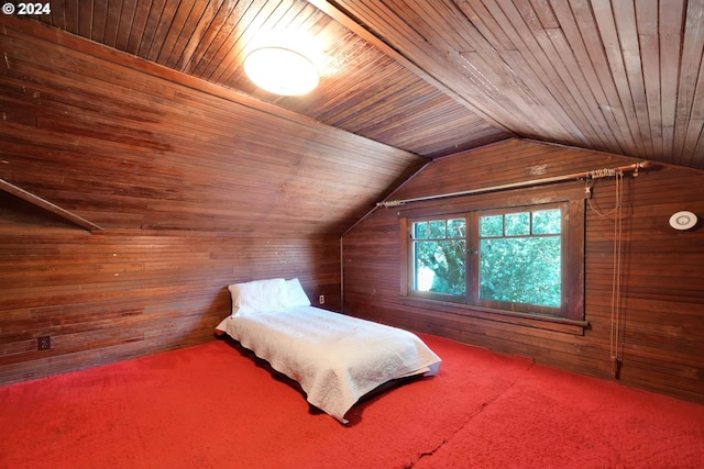 unfurnished bedroom featuring carpet flooring, wooden walls, wood ceiling, and lofted ceiling