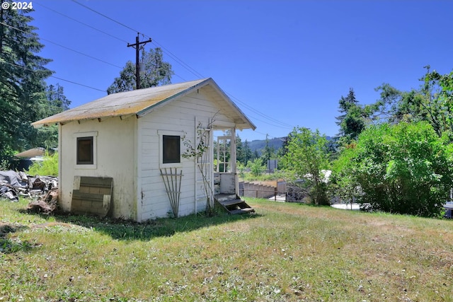 exterior space with a lawn