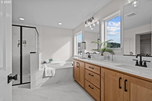 12785 SW Trask St, Beaverton, OR 97007 - bathroom featuring a shower stall, double vanity, a garden tub, marble finish floors, and recessed lighting