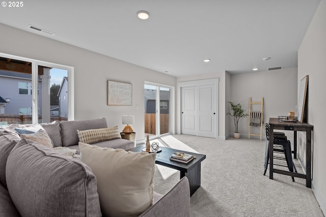 12785 SW Trask St, Beaverton, OR 97007 - carpeted living room featuring plenty of natural light, baseboards, and recessed lighting