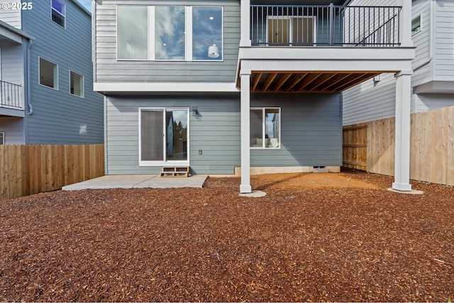 12785 SW Trask St, Beaverton, OR 97007 - back of house with a balcony, a fenced backyard, and a patio area