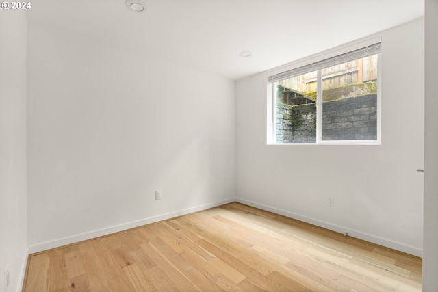 unfurnished room featuring light hardwood / wood-style flooring