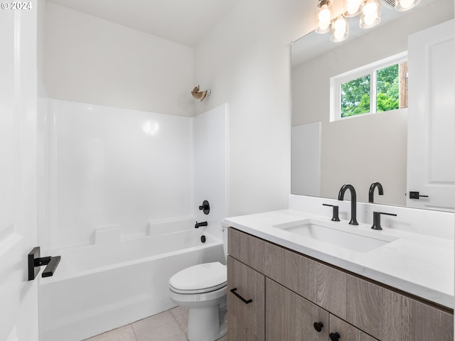 full bathroom featuring tile patterned floors, vanity, toilet, and shower / washtub combination