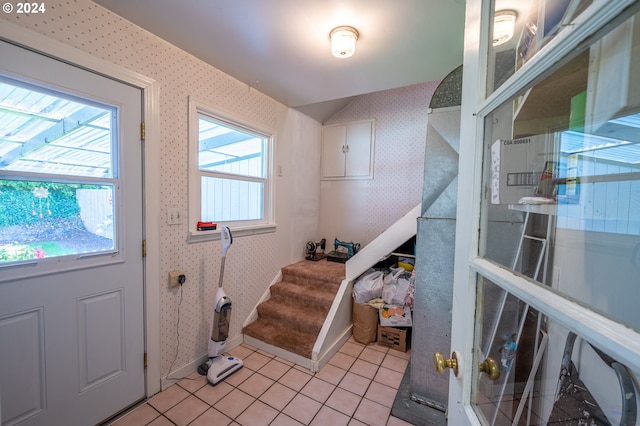 interior space featuring light tile patterned floors