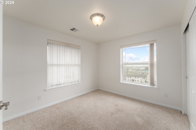 view of carpeted spare room