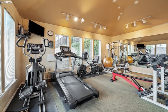 gym with lofted ceiling