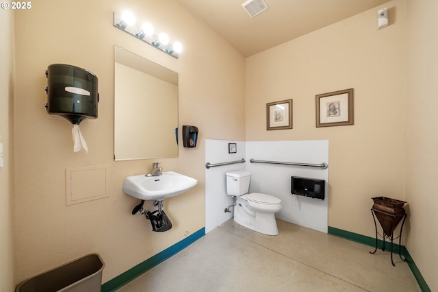 bathroom featuring toilet