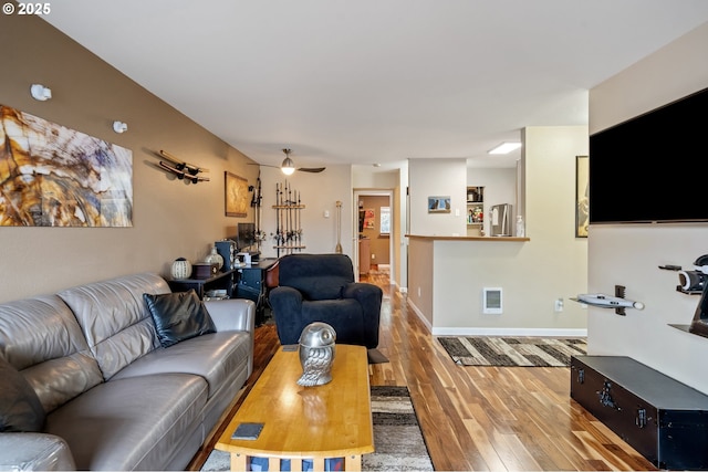 living room with light hardwood / wood-style floors