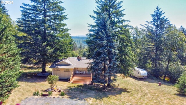 view of front of house featuring a wooden deck