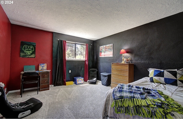 bedroom featuring a textured ceiling and carpet