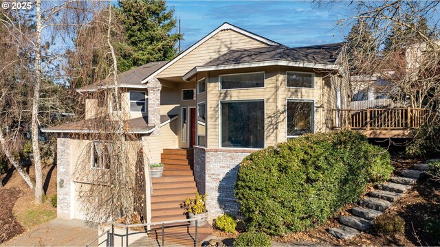 view of front of property with a deck