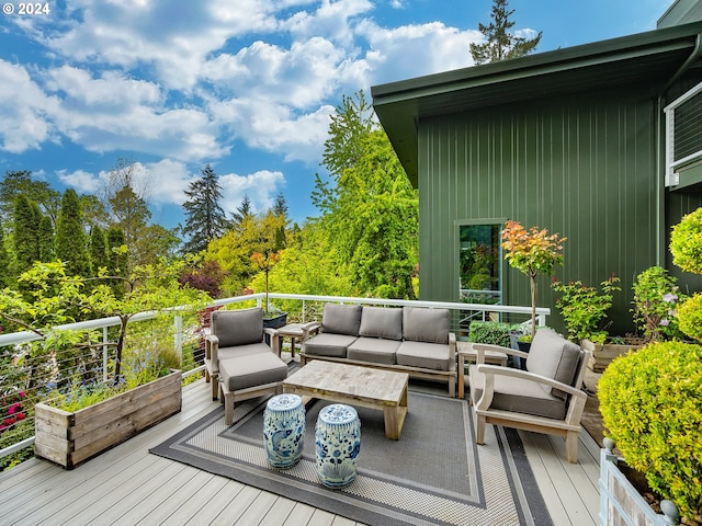 wooden deck with an outdoor hangout area