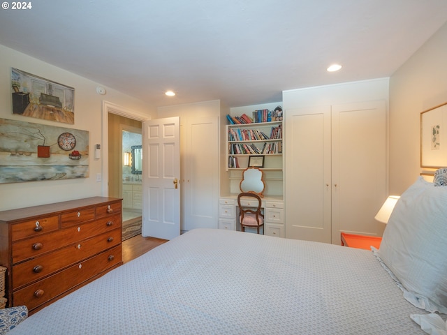 bedroom with a closet and recessed lighting