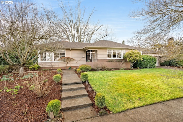 view of front of property with a front yard