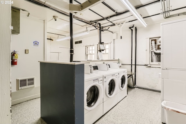 laundry area with separate washer and dryer