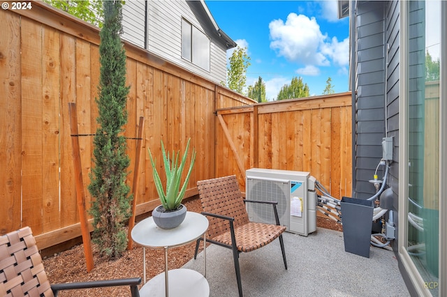 view of patio featuring ac unit