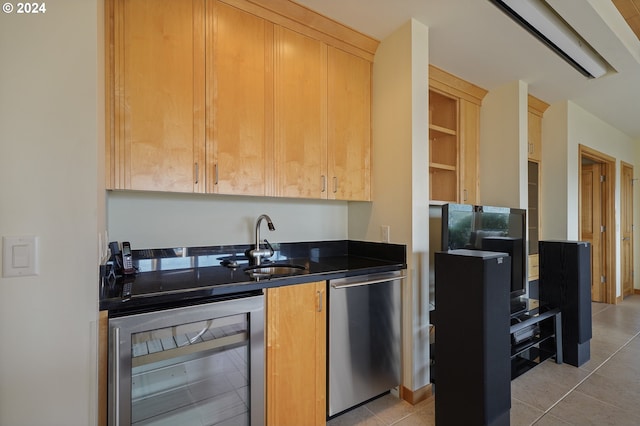 kitchen with stainless steel dishwasher, light tile patterned flooring, light brown cabinets, and beverage cooler