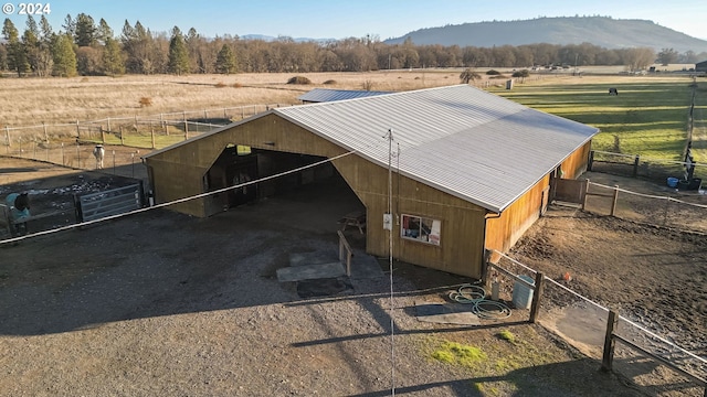 bird's eye view featuring a mountain view and a rural view