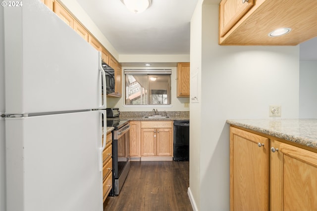 kitchen featuring light brown cabinetry, sink, black dishwasher, and stainless steel range with electric cooktop