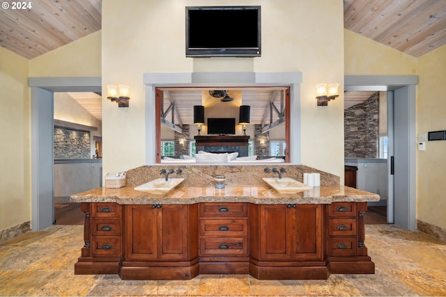 bathroom with vanity, high vaulted ceiling, and wooden ceiling