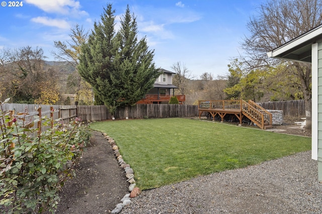 view of yard featuring a deck