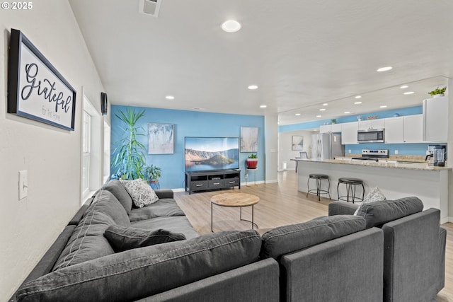 living room featuring light hardwood / wood-style floors