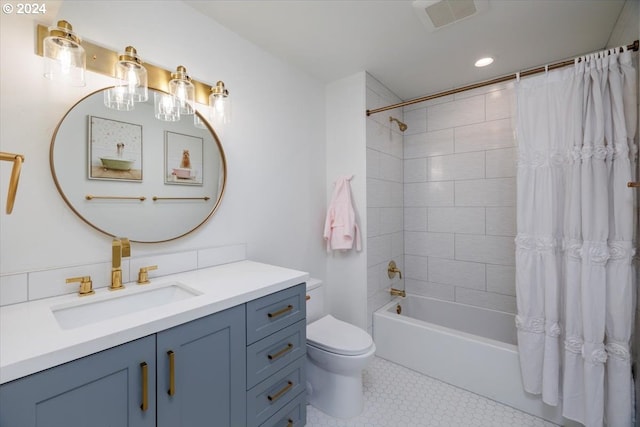 full bath with visible vents, toilet, tile patterned floors, vanity, and shower / bathtub combination with curtain