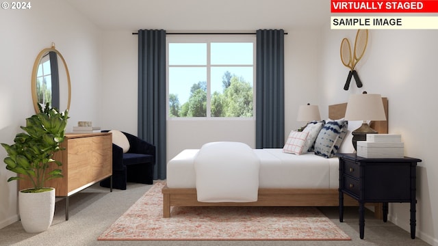 bedroom featuring carpet and multiple windows