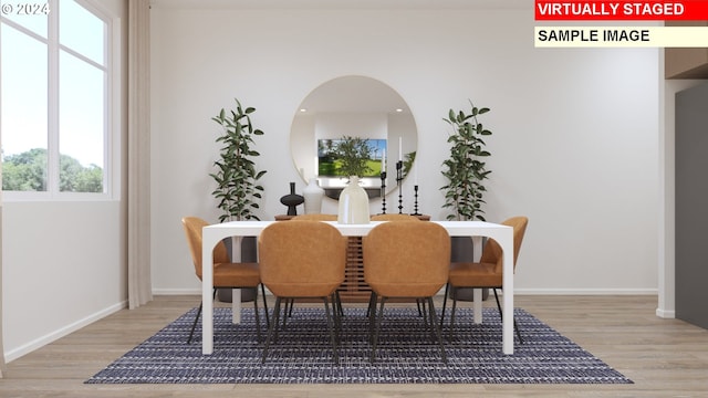 dining room with hardwood / wood-style flooring