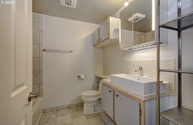 full bathroom featuring decorative backsplash, vanity,  shower combination, tile patterned floors, and toilet