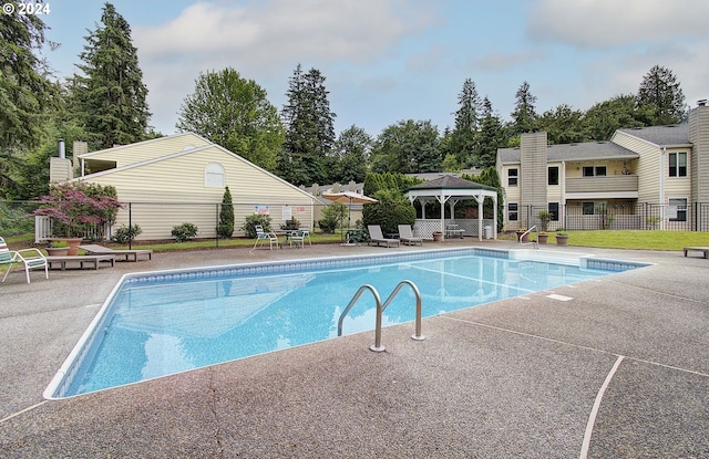 view of pool with a gazebo and a patio