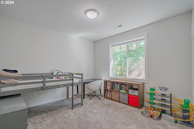 bedroom featuring carpet