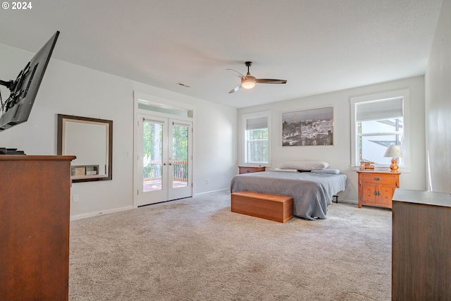 kitchen with vaulted ceiling, appliances with stainless steel finishes, light hardwood / wood-style floors, and a kitchen island