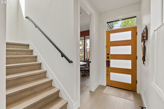 6332 NE 30th Ave, Portland, OR 97211 - foyer entrance featuring wood finished floors and stairway