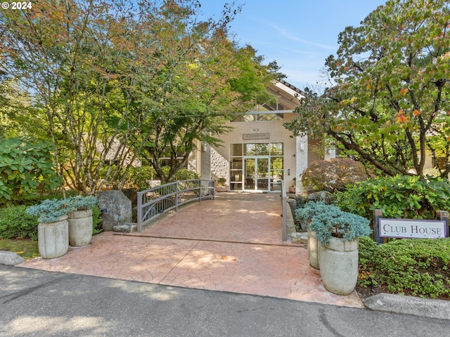 6665 W Burnside Rd Unit 413, Portland, OR 97210 - doorway to property featuring stucco siding