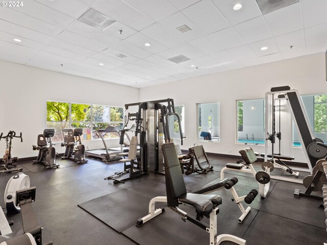 6665 W Burnside Rd Unit 413, Portland, OR 97210 - exercise room featuring plenty of natural light, a drop ceiling, and recessed lighting