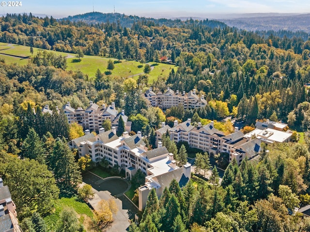 6665 W Burnside Rd Unit 413, Portland, OR 97210 - view of property location with a heavily wooded area
