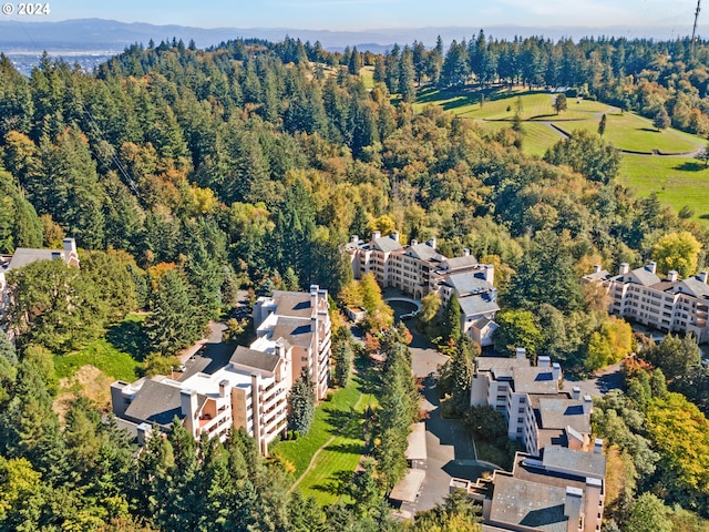 6665 W Burnside Rd Unit 413, Portland, OR 97210 - aerial view of property's location with a heavily wooded area