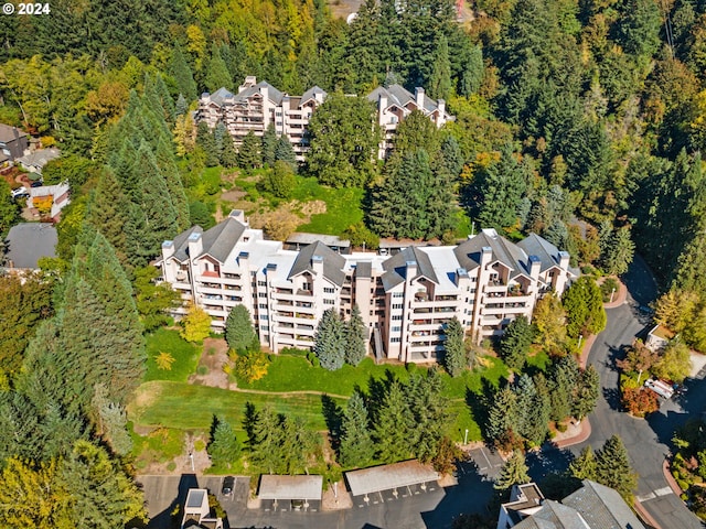 6665 W Burnside Rd Unit 413, Portland, OR 97210 - aerial overview of property's location with a forest