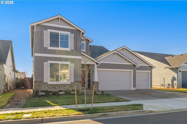 craftsman house with a garage